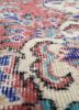 vintage red and orange wool hand knotted Rug - CloseUp