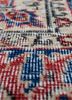 vintage red and orange wool hand knotted Rug - CloseUp