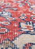 vintage red and orange wool hand knotted Rug - CloseUp vintage red and orange wool hand knotted Rug - CloseUp