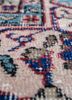 vintage red and orange wool hand knotted Rug - CloseUp vintage red and orange wool hand knotted Rug - CloseUp