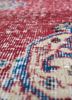 vintage red and orange wool hand knotted Rug - CloseUp