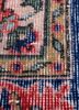vintage red and orange wool hand knotted Rug - CloseUp vintage red and orange wool hand knotted Rug - CloseUp