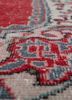 vintage red and orange wool hand knotted Rug - CloseUp vintage red and orange wool hand knotted Rug - CloseUp