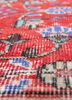 vintage red and orange wool hand knotted Rug - CloseUp vintage red and orange wool hand knotted Rug - CloseUp