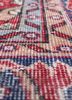 vintage red and orange wool hand knotted Rug - CloseUp vintage red and orange wool hand knotted Rug - CloseUp