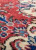 vintage red and orange wool hand knotted Rug - CloseUp vintage red and orange wool hand knotted Rug - CloseUp