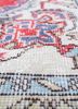 vintage red and orange wool hand knotted Rug - CloseUp