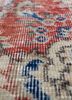 vintage red and orange wool hand knotted Rug - CloseUp