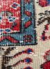 vintage red and orange wool hand knotted Rug - CloseUp