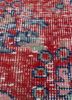 vintage red and orange wool hand knotted Rug - CloseUp vintage red and orange wool hand knotted Rug - CloseUp