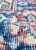 vintage red and orange wool hand knotted Rug - CloseUp vintage red and orange wool hand knotted Rug - CloseUp