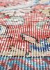 vintage red and orange wool hand knotted Rug - CloseUp vintage red and orange wool hand knotted Rug - CloseUp