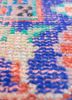 vintage red and orange wool hand knotted Rug - CloseUp vintage red and orange wool hand knotted Rug - CloseUp