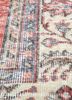 vintage red and orange wool hand knotted Rug - CloseUp vintage red and orange wool hand knotted Rug - CloseUp