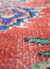 vintage red and orange wool hand knotted Rug - CloseUp vintage red and orange wool hand knotted Rug - CloseUp