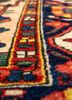 aalam red and orange wool hand knotted Rug - CloseUp