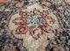 vintage red and orange wool hand knotted Rug - CloseUp vintage red and orange wool hand knotted Rug - CloseUp