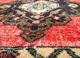 vintage red and orange wool hand knotted Rug - CloseUp