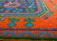 vintage red and orange wool hand knotted Rug - CloseUp