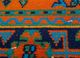vintage red and orange wool hand knotted Rug - CloseUp vintage red and orange wool hand knotted Rug - CloseUp