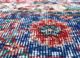 vintage red and orange wool hand knotted Rug - CloseUp vintage red and orange wool hand knotted Rug - CloseUp