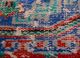 vintage red and orange wool hand knotted Rug - CloseUp vintage red and orange wool hand knotted Rug - CloseUp
