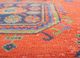 vintage red and orange wool hand knotted Rug - CloseUp vintage red and orange wool hand knotted Rug - CloseUp