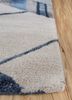 linear blue wool and viscose hand tufted Rug - Corner