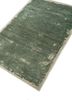 urban pause by kavi green wool hand knotted Rug - FoldShot urban pause by kavi green wool hand knotted Rug - FoldShot