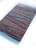 manchaha pink and purple wool and bamboo silk hand knotted Rug - FoldShot manchaha pink and purple wool and bamboo silk hand knotted Rug - FoldShot