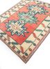 nuray red and orange wool hand knotted Rug - FoldShot nuray red and orange wool hand knotted Rug - FoldShot