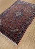 aalam red and orange wool hand knotted Rug - FoldShot aalam red and orange wool hand knotted Rug - FoldShot