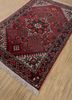 aalam red and orange wool hand knotted Rug - FoldShot aalam red and orange wool hand knotted Rug - FoldShot