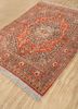 aalam red and orange wool hand knotted Rug - FoldShot aalam red and orange wool hand knotted Rug - FoldShot