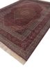 aalam red and orange wool hand knotted Rug - FoldShot aalam red and orange wool hand knotted Rug - FoldShot