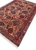 aalam red and orange wool hand knotted Rug - FoldShot aalam red and orange wool hand knotted Rug - FoldShot