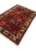aalam red and orange wool hand knotted Rug - FoldShot aalam red and orange wool hand knotted Rug - FoldShot