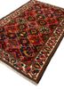 aalam red and orange wool hand knotted Rug - FoldShot aalam red and orange wool hand knotted Rug - FoldShot