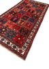 aalam red and orange wool hand knotted Rug - FoldShot aalam red and orange wool hand knotted Rug - FoldShot