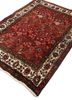 aalam red and orange wool hand knotted Rug - FoldShot aalam red and orange wool hand knotted Rug - FoldShot