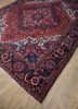 aalam red and orange wool hand knotted Rug - FoldShot aalam red and orange wool hand knotted Rug - FoldShot