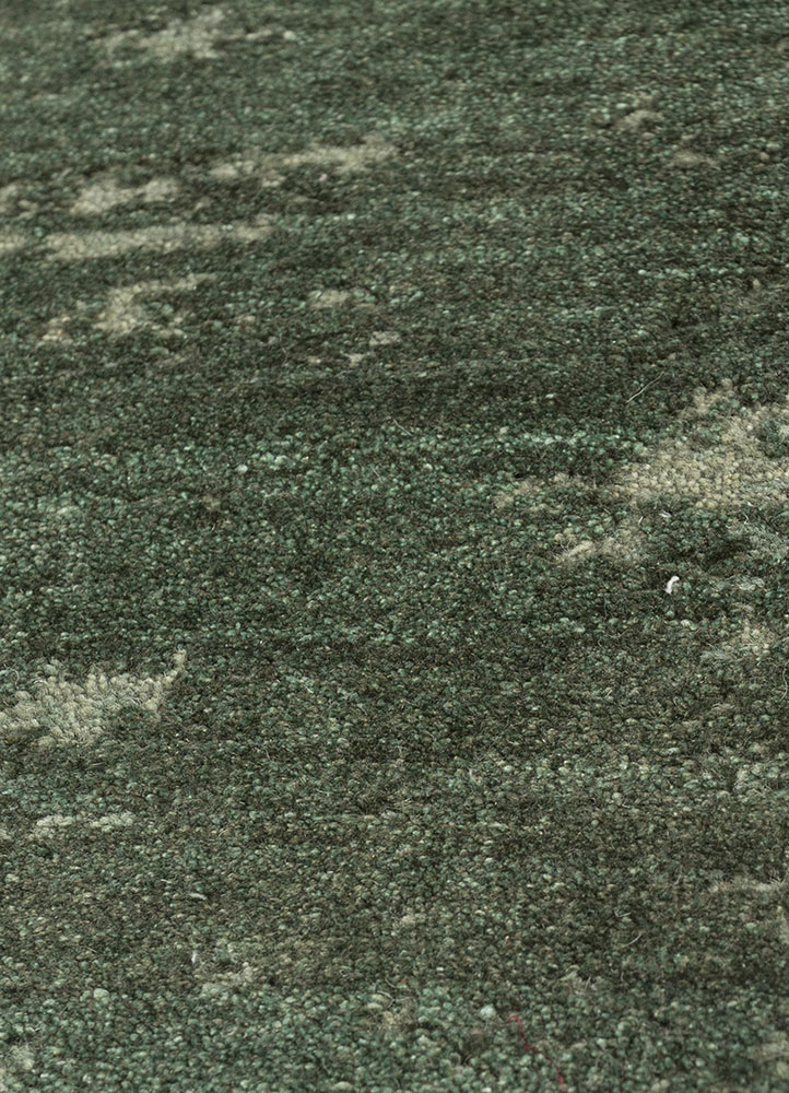 urban pause by kavi green wool hand knotted Rug - CloseUp