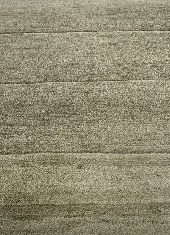 sthir green wool hand knotted Rug - CloseUp