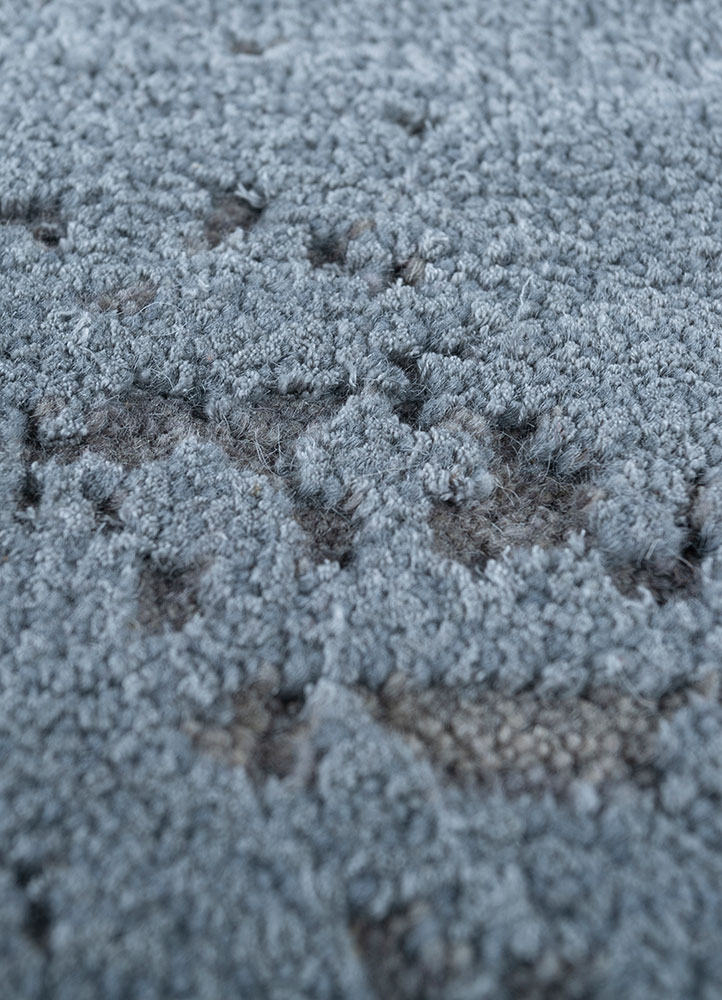 urban pause by kavi blue wool and silk hand knotted Rug - CloseUp