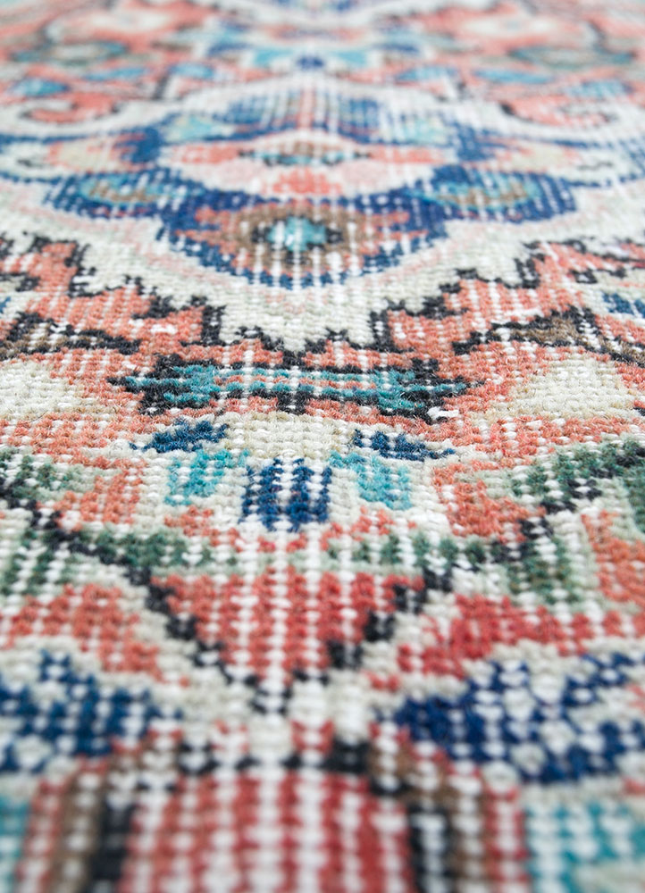 vintage red and orange wool hand knotted Rug - CloseUp