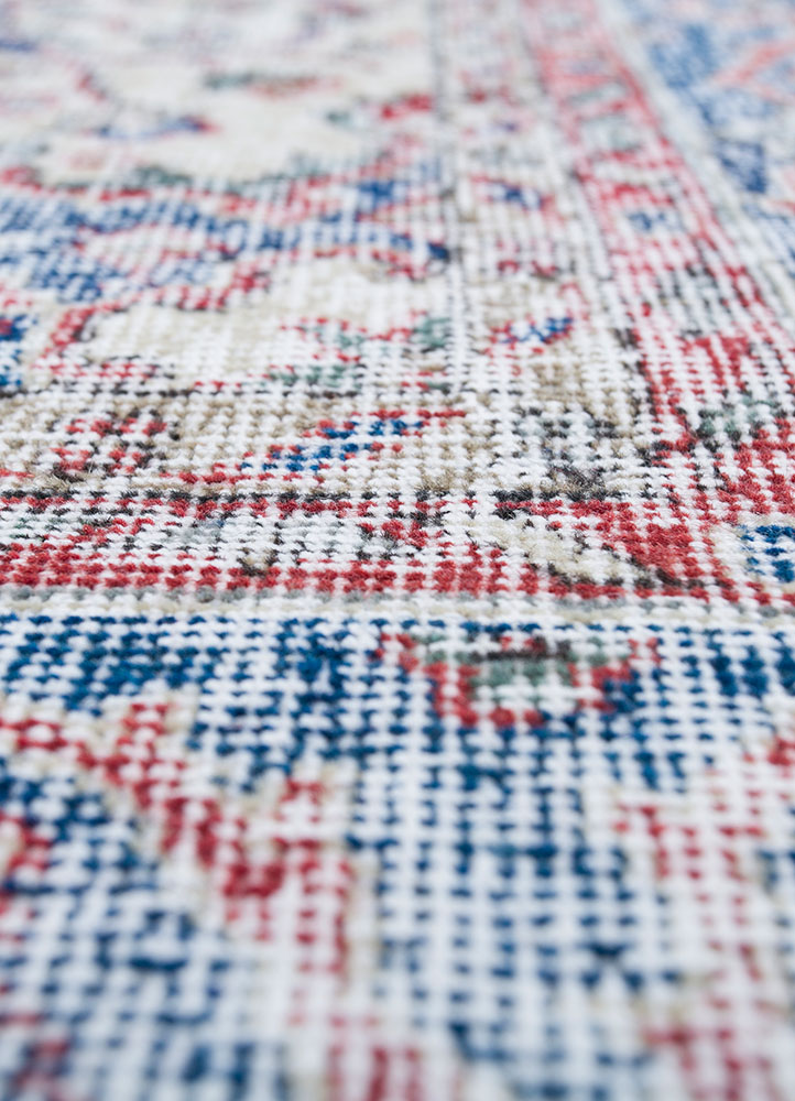 vintage red and orange wool hand knotted Rug - CloseUp