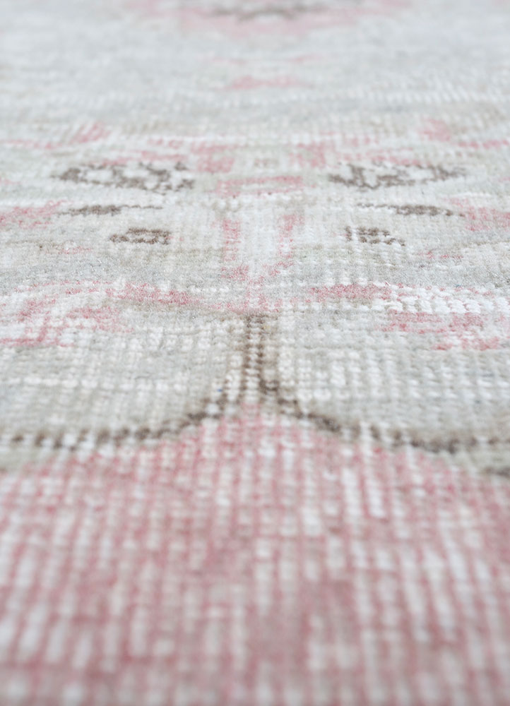 vintage pink and purple wool hand knotted Rug - CloseUp