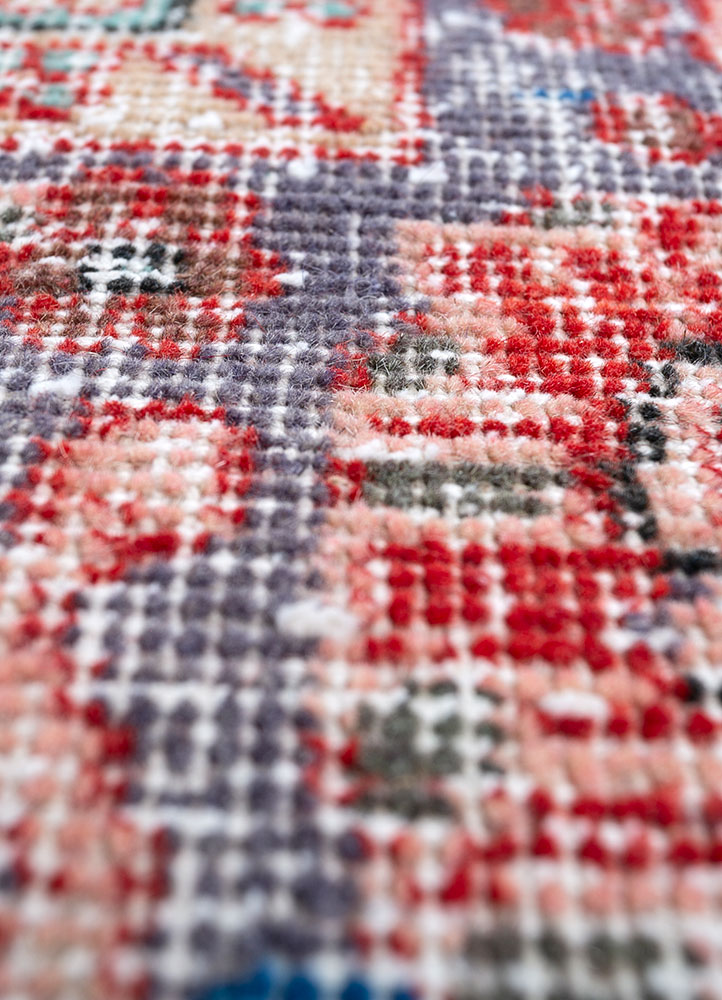 vintage red and orange wool hand knotted Rug - CloseUp