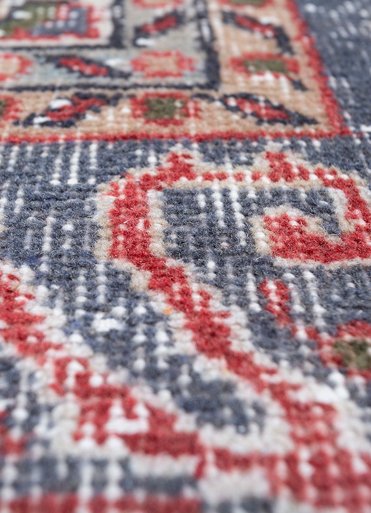 vintage red and orange wool hand knotted Rug - CloseUp