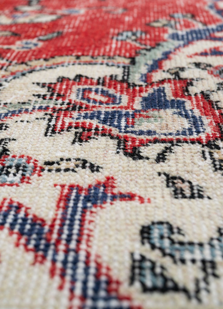 vintage red and orange wool hand knotted Rug - CloseUp